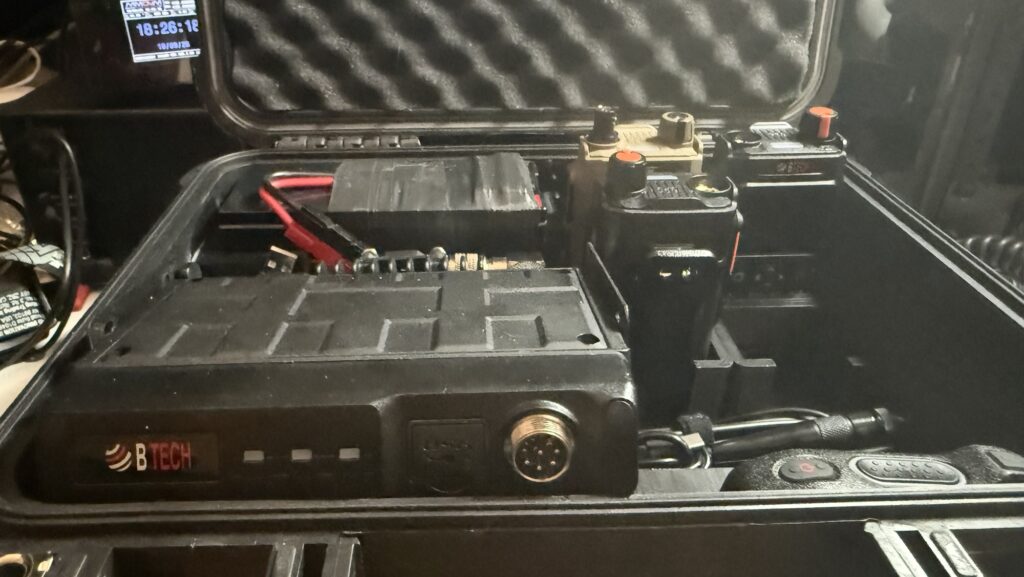 Grab and Go Box: the Pelican case open showing the BTECH UV-50PRO base station and handhelds packed inside